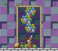 une photo d'Ã©cran de Puzzle Bobble - Bust a Move sur Nintendo Super Nes